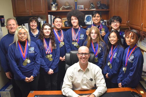 Middle College High's students with Principal Jamison Whiting. 